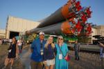 Our tourists near Soyuz spaceship on roll-out of rocket