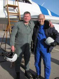 Happy tourist with the pilot Andrey Pechonkin