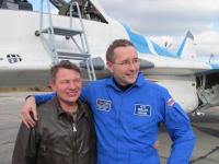 Happy Canadian tourist with Russian pilot